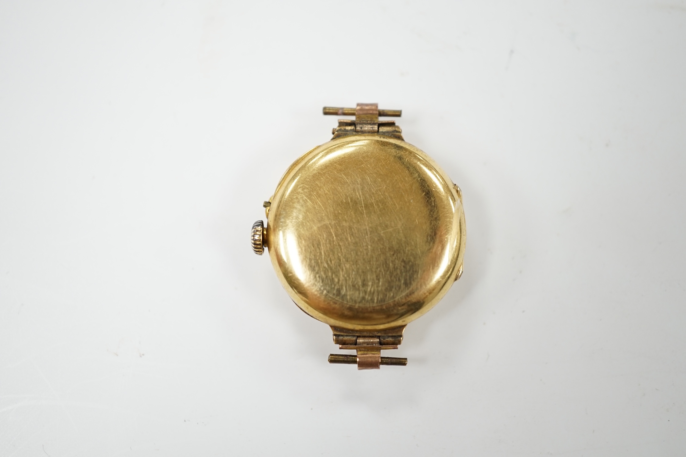 A lady's 18k manual wind wrist watch, with Arabic dial, no strap, gross weight 17.1 grams, Condition - poor